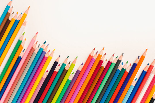 colored pencils on white background