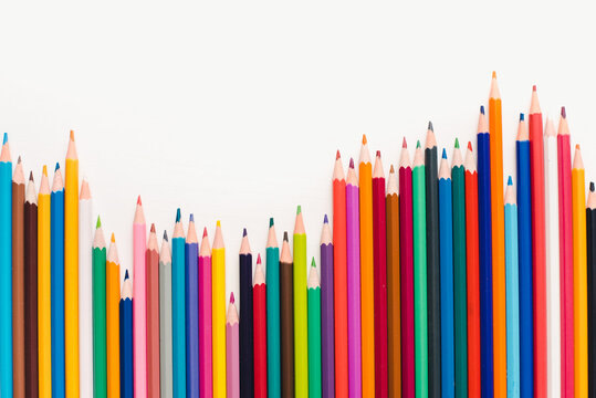 colored pencils on white background