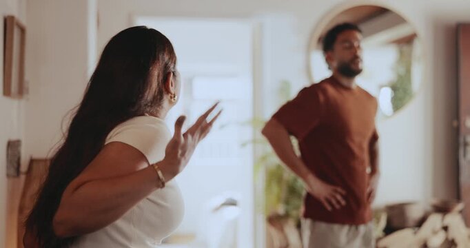 Fight, argument and couple in home with tension, angry or disappointment in relationship affair. Upset, man or woman in house with disagreement, frustration or infidelity crisis with marriage issue.