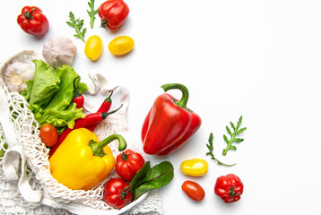 Fresh organic vegetables in mesh shopping bag