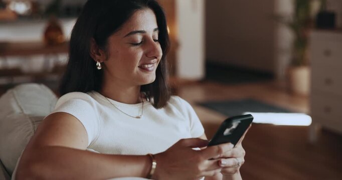 Couch, reading or woman typing with phone on weekend, social network or check message app for alert. Notification, digital communication or happy person texting in home, email response or online chat