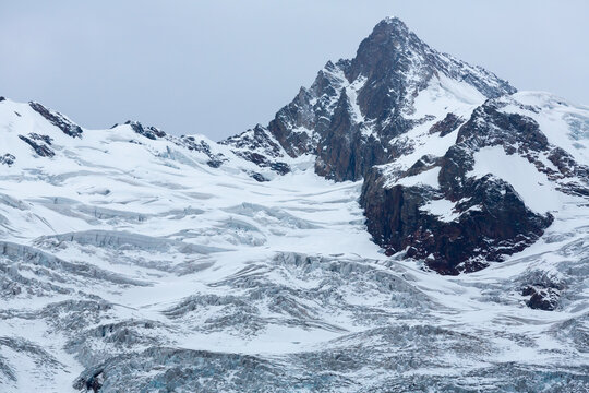 Scenery of high snow-capped mount and glacier in the Alibek Gorge,