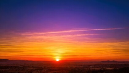 Fototapeta premium Vibrant Sunset Over a Serene Landscape.