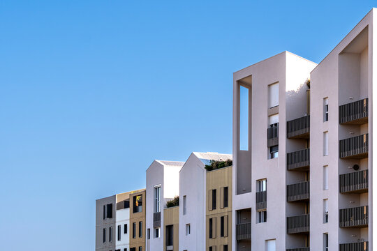 Modern residential apartments architecture facade with minimalism and skyline in Port Marianne Montpellier France presenting new housing district