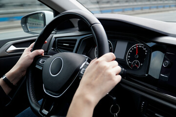 Driver Keeps Hands on Steering Wheel While Driving