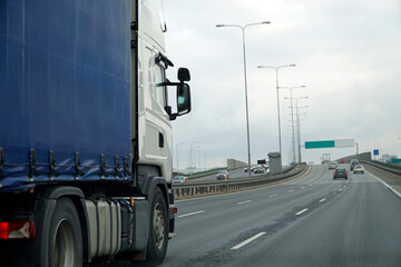 Heavy Truck Transports Cargo on a Highway