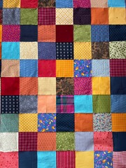 Fototapeta premium View from above on a patchwork blanked before being quilted