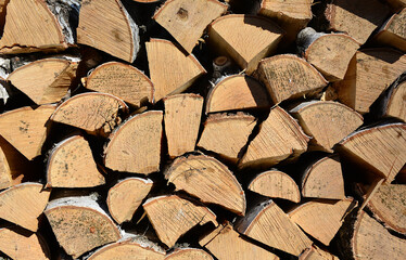 a front view of Stacked Birch Firewood Logs close up