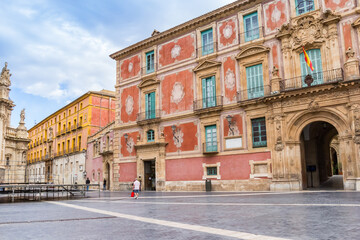 Fototapeta premium Cathedral square with colorful buildings in Murcia, Spain