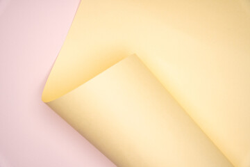 Soft Curved Yellow Paper on Light Background