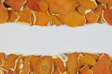 Naklejka premium Orange peel frame with top and bottom borders and copy space on white background 