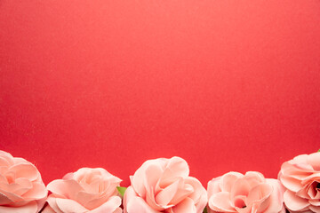 Pink Roses on Red Background with Copy Space