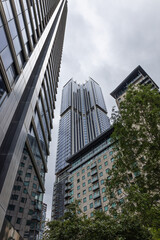 Obraz premium Low angle view of modern glass skyscrapers in city center