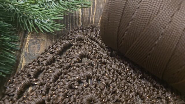 A crochet pattern of brown squares, perfect for home decor and fashion.