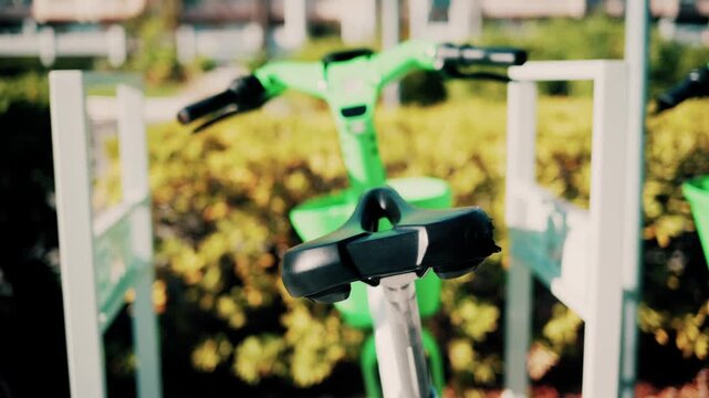 Bikes in a row on a sunny day close up view on a stationary motion with beautiful blur background