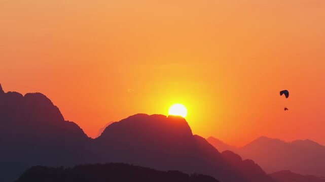 Paragliding at Sunset in Vang Vieng