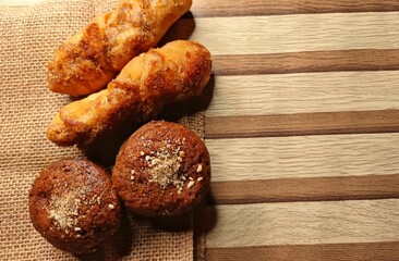Assorted Sweet Bread on Wooden Background