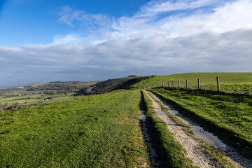 Looking along a pathway in rural Sussex at Fulking Hill, on a sunny autumnal day