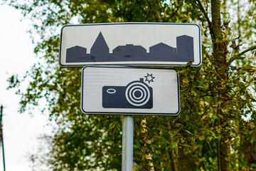 Road Signs Indicating a Scenic City View Photography Spot