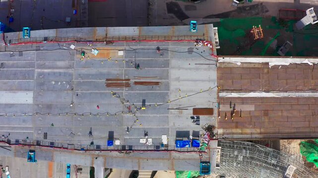 Aerial Construction Site with Safety Barriers and Equipment