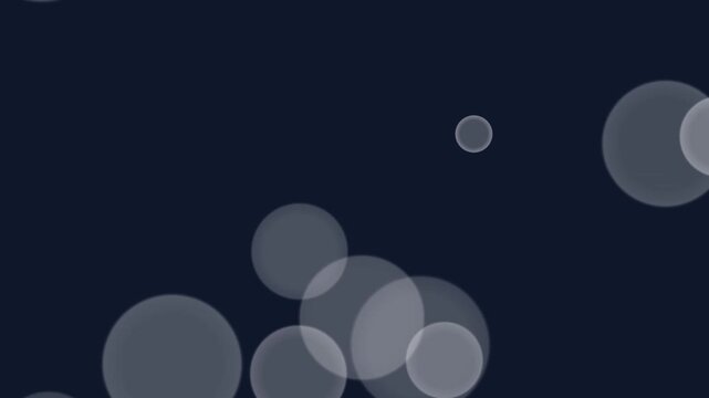 motion none Horizontal Bokeh effect with gray circles on dark background