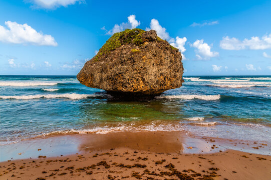 A view from the shoreline towards a wave eroded rock at Bathsheba on the Atlantic coast of Barbados in January