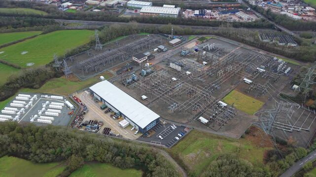 Aerial view of the Enderby Substation National Grid shows a vast electrical distribution center and adjacent structures, Enderby, Enderby, United Kingdom.
