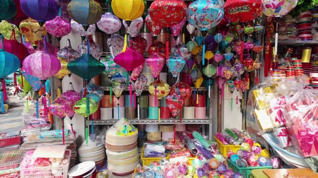 A vibrant display of colorful lanterns and gifts for sale at a shop in Old Quarter, Hanoi, Vietnam. The lanterns are a popular souvenir for tourists visiting the city.