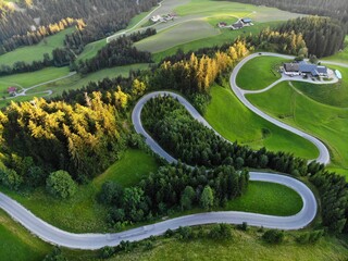 Fototapeta premium Austria drone view. Postalm panorama road. Scenic winding mountain road in Salzkammergut region.