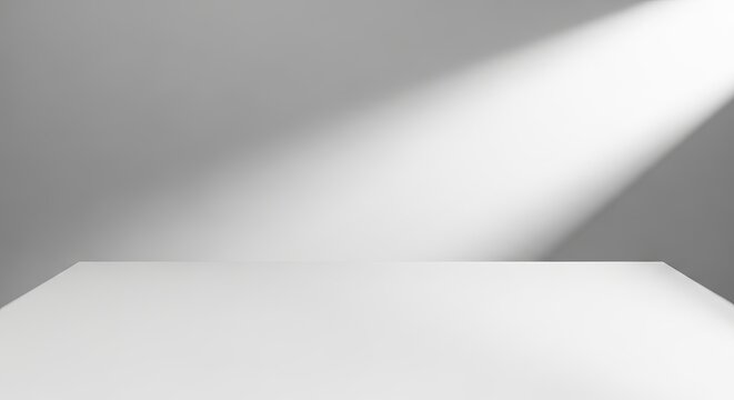 Clean White Tabletop Perspective with Direct Overhead Spotlight Shadow and Backdrop