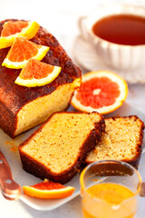 Fresh baking delicious orage loaf cake with syrup