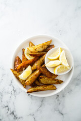 Roasted potato wedges with tartar sauce