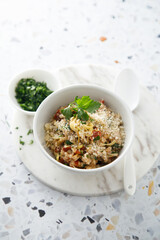 Savory oatmeal porridge with tomatoes and cheese