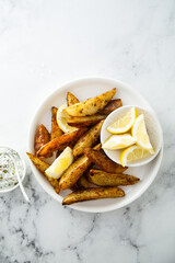 Roasted potato wedges with tartar sauce