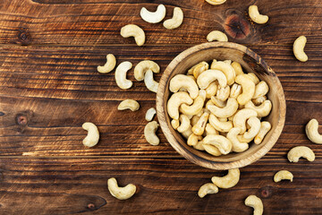 A bowl filled with fresh and crisp cashews. © nikolaydonetsk