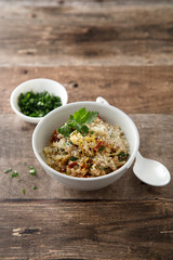 Savory oatmeal porridge with tomatoes and cheese