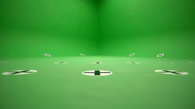 Green studio with floor markers