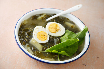 Spring soup with wild herbs