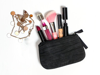 Small textile open bag with makeup and other beauty accessories 