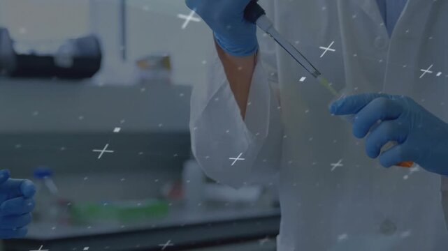 On start right researcher handing orange-capped tube then loading pipette tip for sample collection