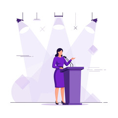 Woman speaking at podium with microphones under spotlights at conference or presentation