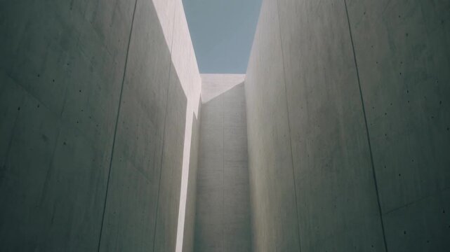 vertical courtyard made of pale concrete and soft indirect lighting