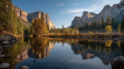 Fototapeta premium Majestic Yosemite Valley landscape with Half Dome and El Capitan bathed in golden hour light