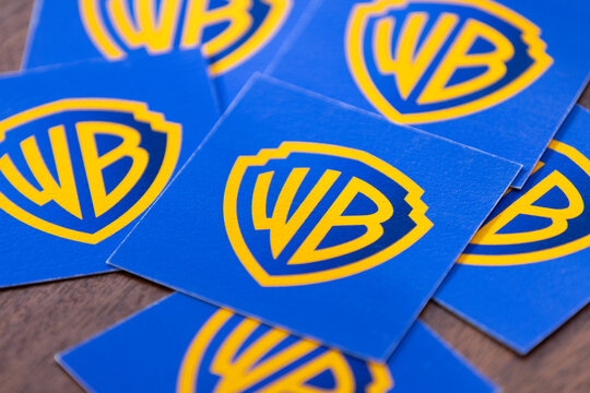 London, UK - February 11 2026: Warner Bros yellow and blue logo. Warner bros is a global media entertainment company
