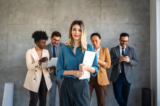 Success group of multiethnic entrepreneurs and business people achieving goals in corporate office