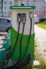 Public charging station for electric vehicles on a city street.