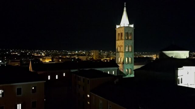 Aerial drone night view of the iconic circular Church of St. Donatus, one of Zadar s most famous pre Romanesque landmarks