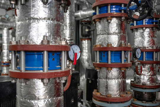 Industrial pipes and gauges in a construction site