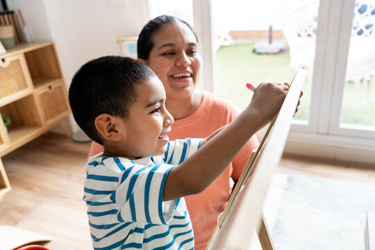 Mother and son enjoying creative time at home