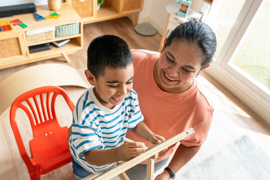 Mother and son enjoying creative time at home